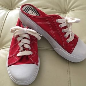 Maurice’s red sneakers